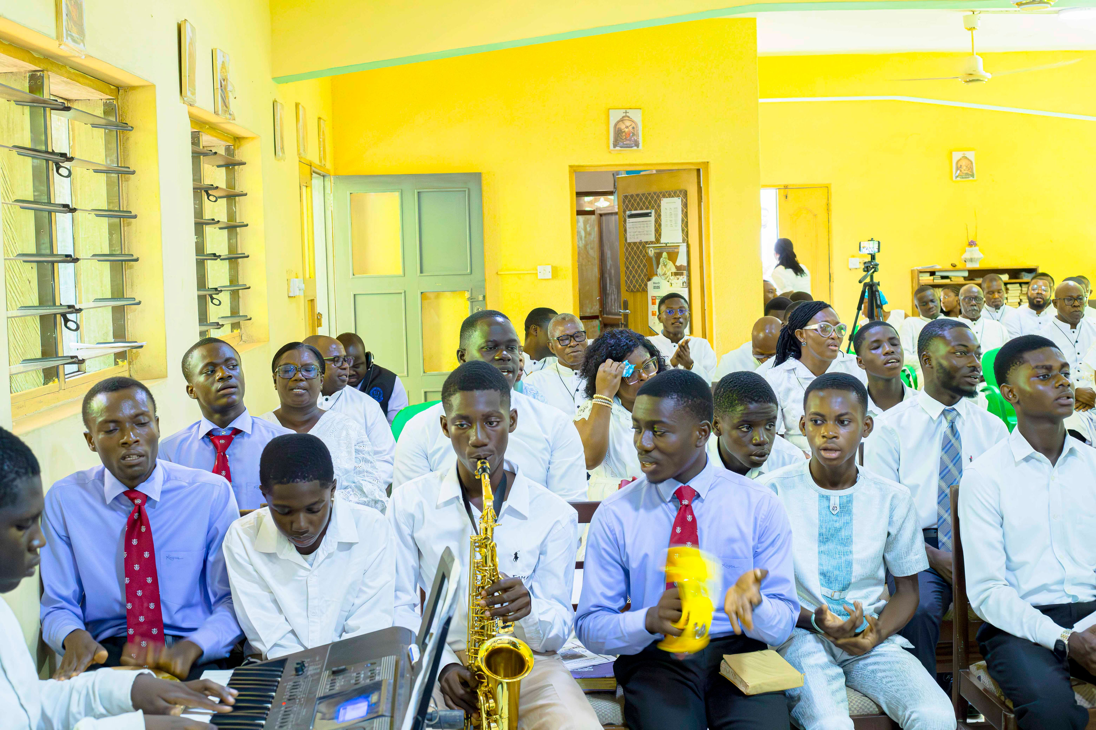 Holy Cross brothers and community gathered together